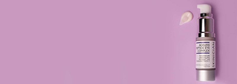 Bottle of SKINICIAN Ageless Peptide Eye Complex placed on a purple background with product swatch