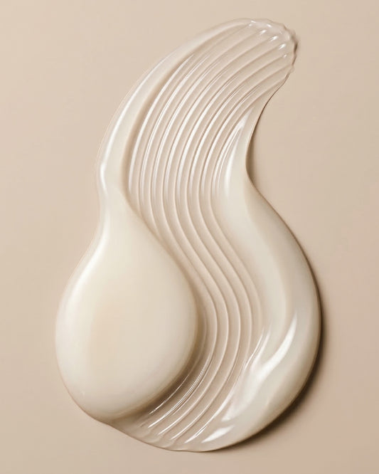 Image of a Skinician Peptide Lift & Firm Serum texture swatch on a beige background