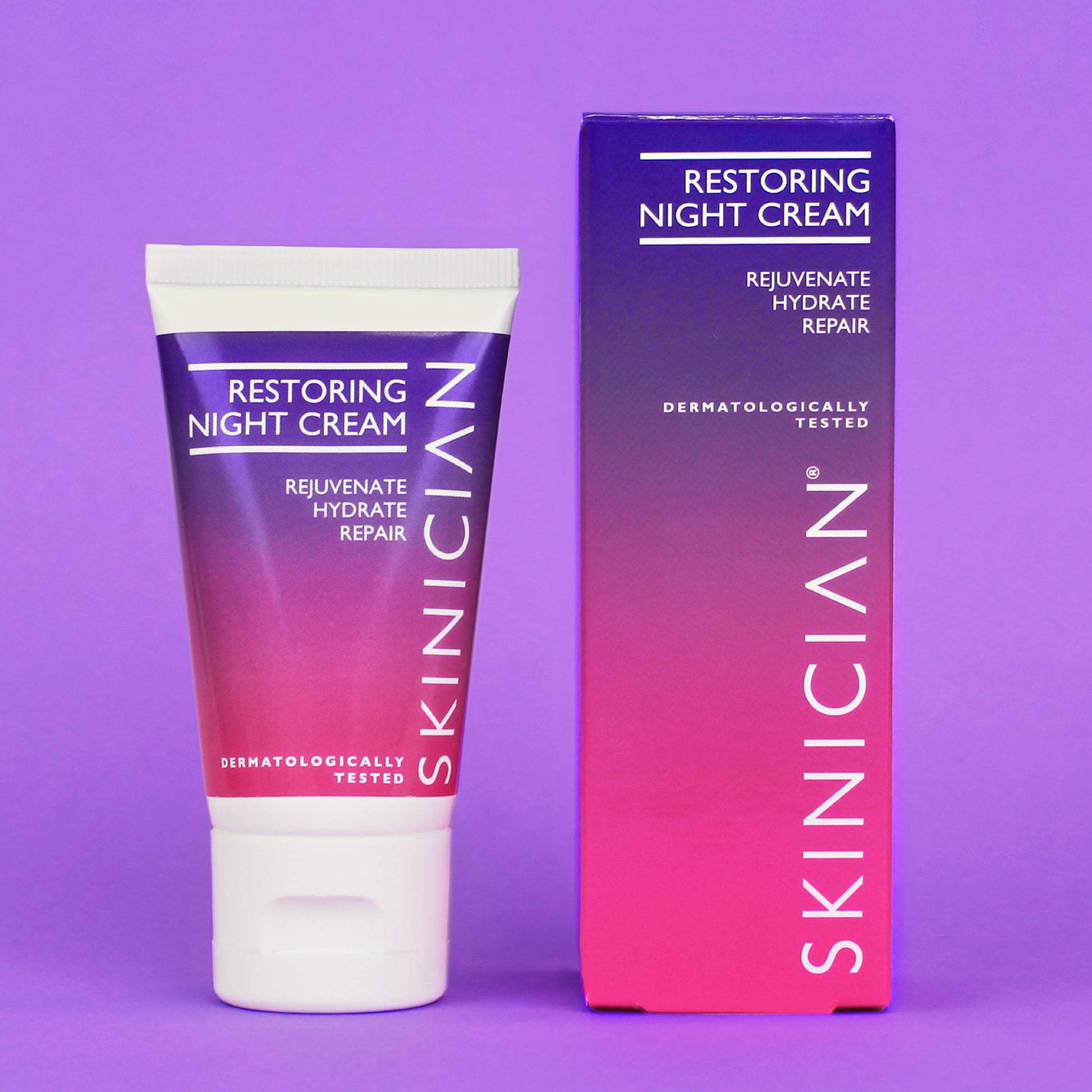 Skinician restoring night cream tube and box on a purple background