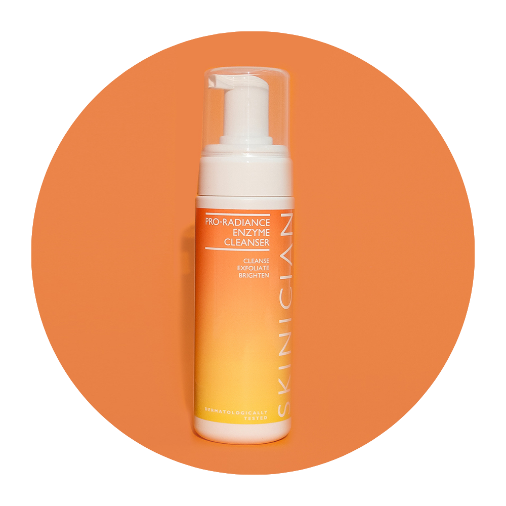 Round image of Skinician Pro-Radiance Enzyme Cleanser bottle on orange background