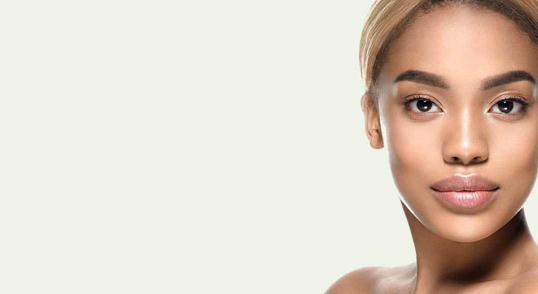 Image of female model on a light grey background