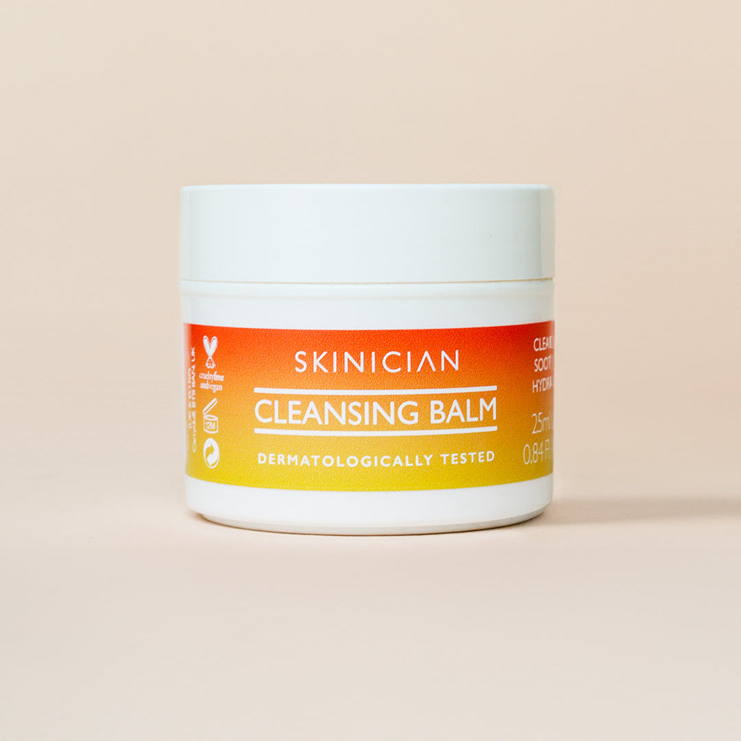 Travel-Size Skinician cleansing balm jar on a beige background