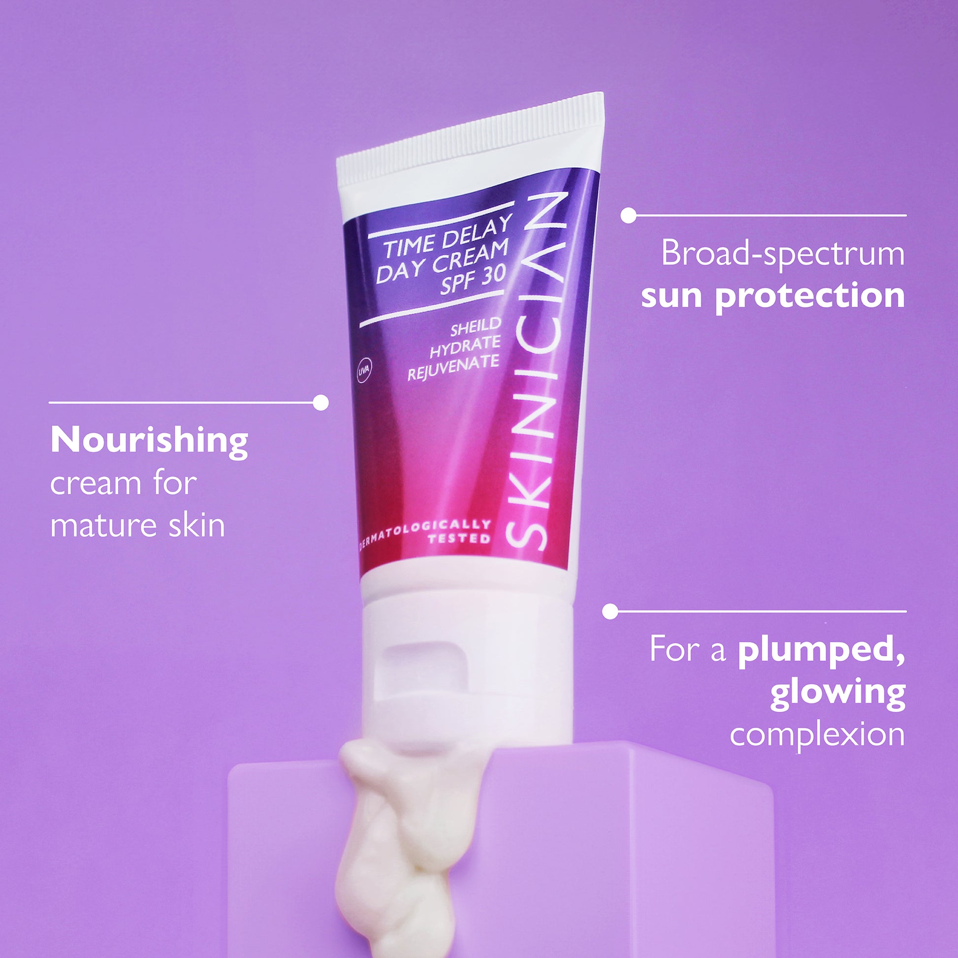 An annotated image of SKINICIAN Time Delay Day Cream SPF 30 on purple background. The annotations say 'Nourishing cream for mature skin', 'Broad-spectrum sun protection' and 'For a plumped glowing complexion'