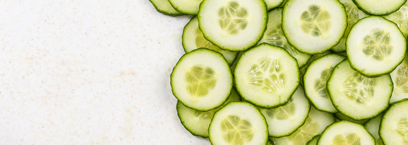 Slices of cucumber on a white background