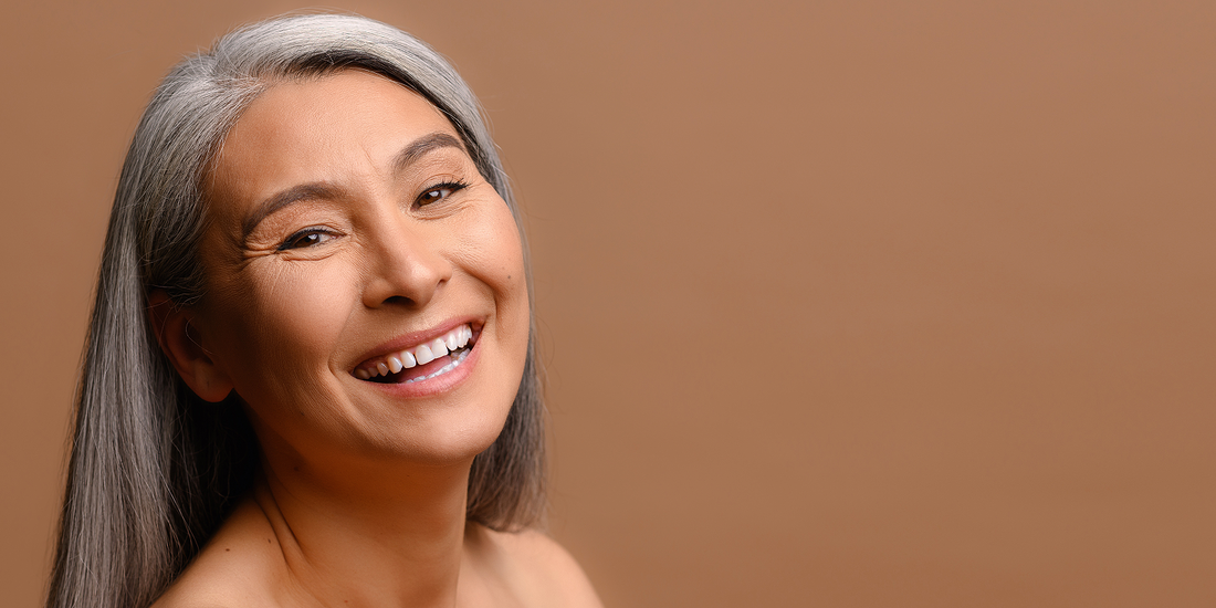 image of woman with grey hair happy and smiling