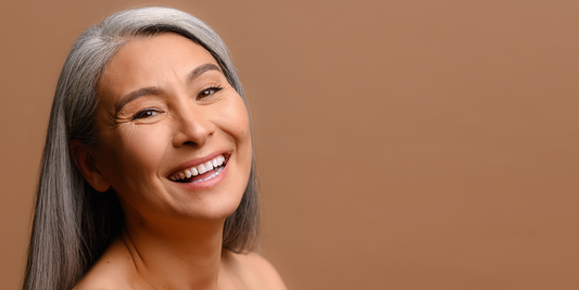 image of woman with grey hair happy and smiling