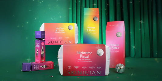 Skinician 2025 gift set collection of all curated skin care sets showcased on a green velvet christmas display background