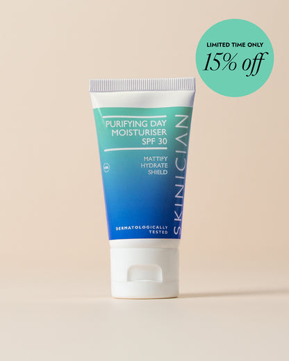 Tube of Skinician Purifying Day Moisturizer SPF 30 on a beige background with a discount label.