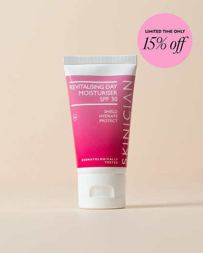 Skinician Revitalising Day Moisturiser on beige background, featuring a 15% discount offer.