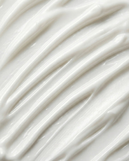 Close up image showing the creamy texture of Skinician Daily Defence SPF