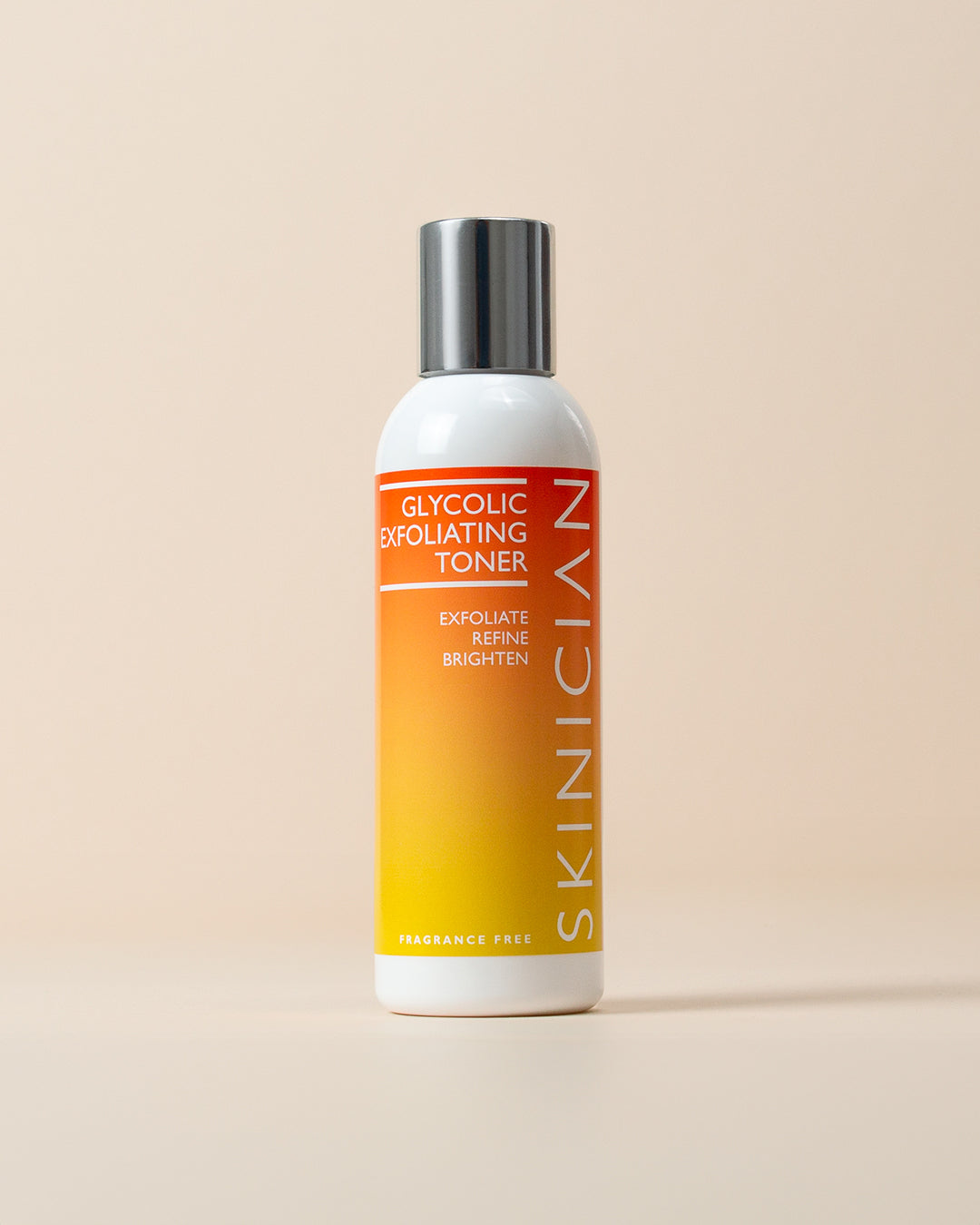 Image of Glycolic Exfoliating Toner bottle and box on a beige background