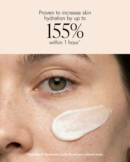 Close-up of a person's face with a stripe of Daily Defence SPF 50 applied to her cheek. The image features the text "proven to increase skin hydration by up to 155% within 1 hour"