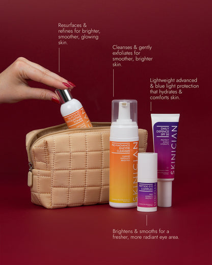 Image of four Skinician skincare products arranged in front of a quilted cosmetic bag on a deep red background. White callout lines with text describe each product's benefits.