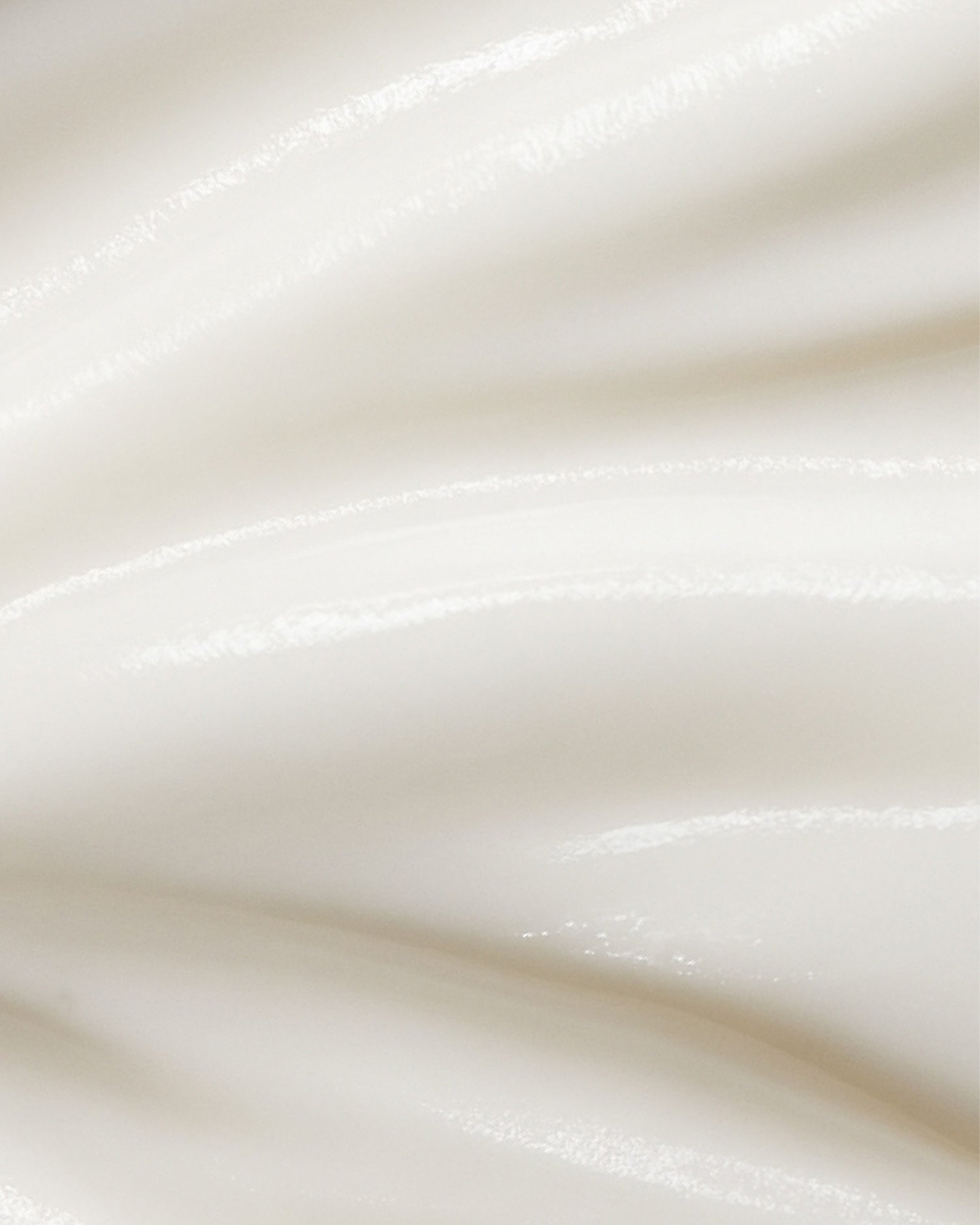 Close-up of smooth, white cream texture of Revitalising Cleanser