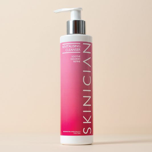 Skinician Revitalising Cleanser on a beige background