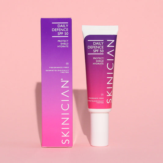 image of Skinician Daily Defence SPF 50 moisturiser on pink background