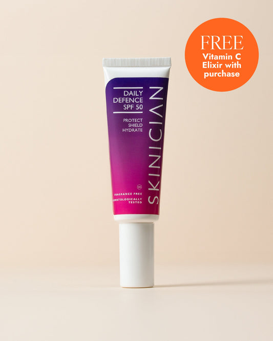 Skinician Daily Defense on a beige background. Image features a circle with text "Free vitamin C elixir with purchase"