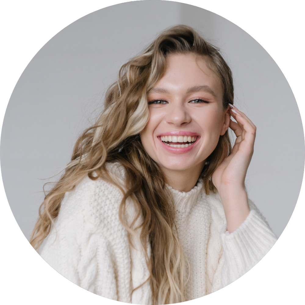 Round image of young woman smiling to represent Skinician customer