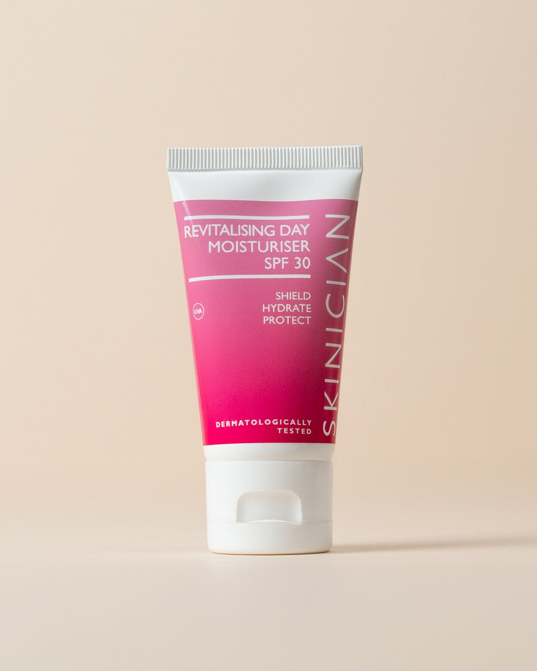 Revitalising Day Moisturiser SPF 30 by Skinician on a beige background