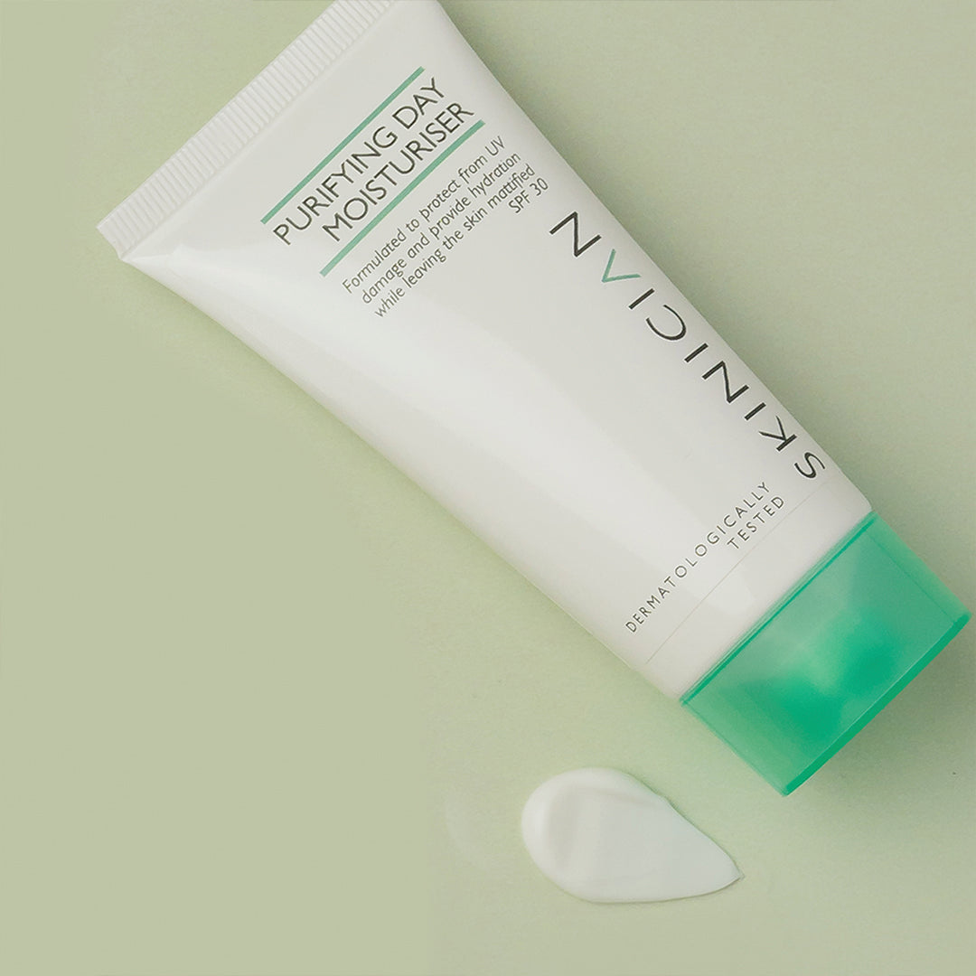 Purifying moisturizer laying on its side with a lightweight moisturiser texture shown beside the tube