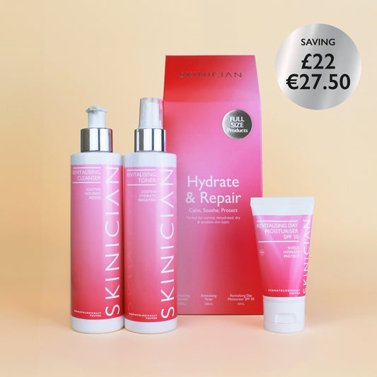 Image of Skinician Hydrate and Repair set outer box beside the products it contains on a beige background. The image features the text "saving £22 / €27.50"