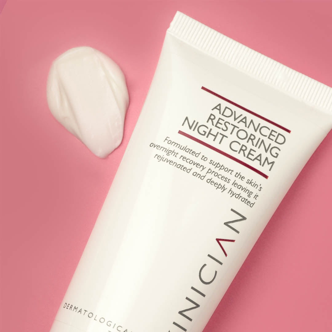 SKINICIAN Restoring Night Cream texture beside the tube.