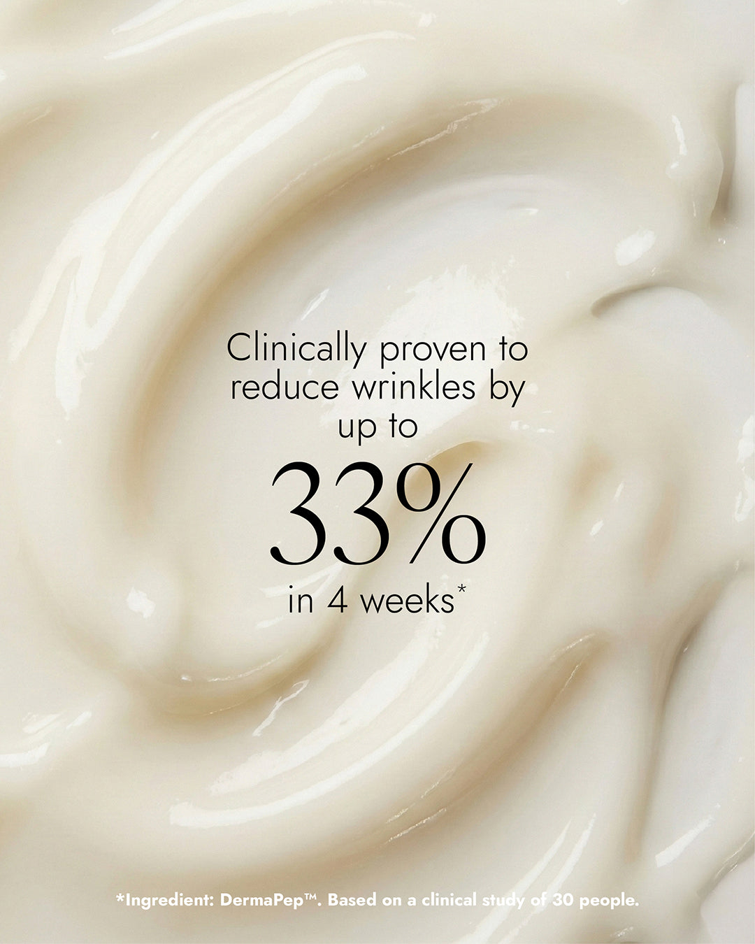 Close-up of a smooth, white texture of powerbalm with text "clinically proven to reduce wrinkles by up to 33% in 4 weeks"