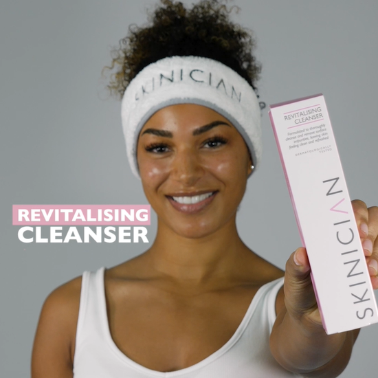 Youtube video of a lady cleansing her face with the milky revitalising cleanser after removing it from its box.